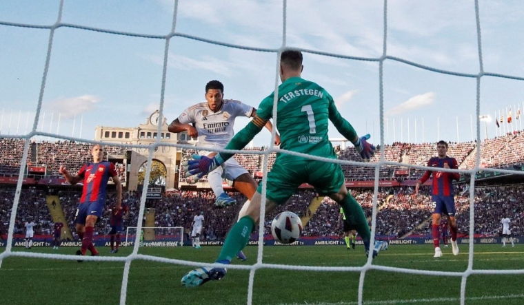 Real Madrid's Jude Bellingham scores against Barcelona | Reuters